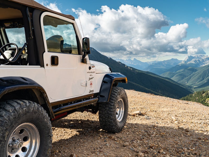White Chevrolet SUV on the highway